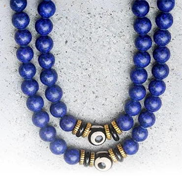 Lapis Lazuli mala necklace featuring an evil eye protection charm