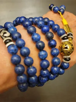 Lapis Lazuli mala bracelet stack worn on the wrist